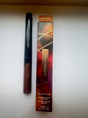 FENTY BEAUTY Glitty Lid Shimmer Liquid Eyeliner in Shade "Boozy Bronze"